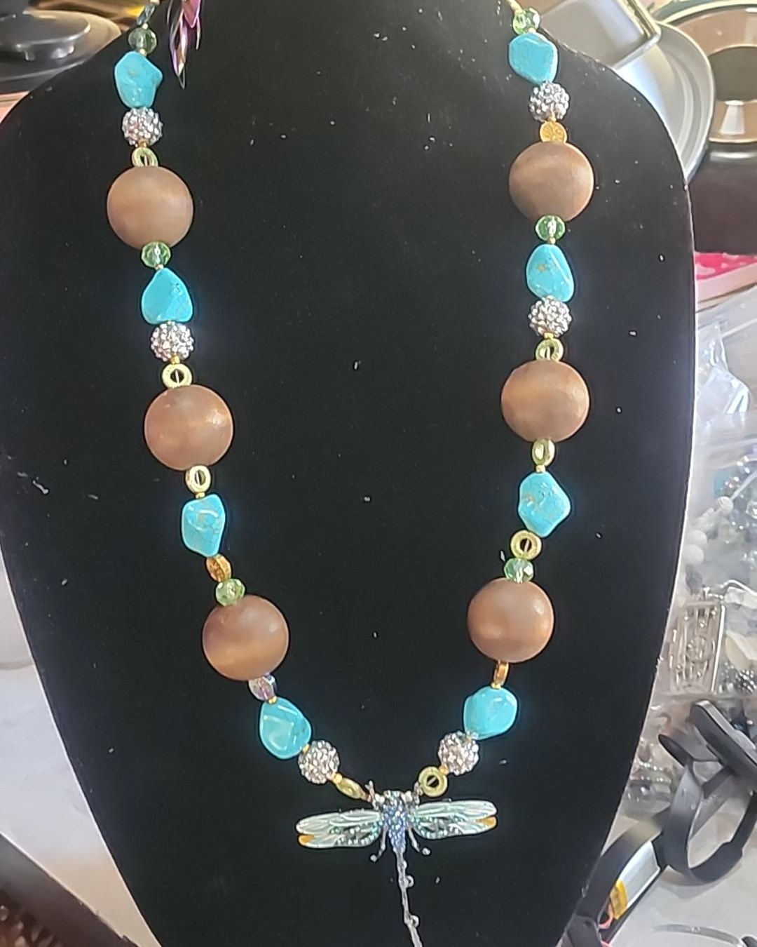 Stone and wood dragonfly.