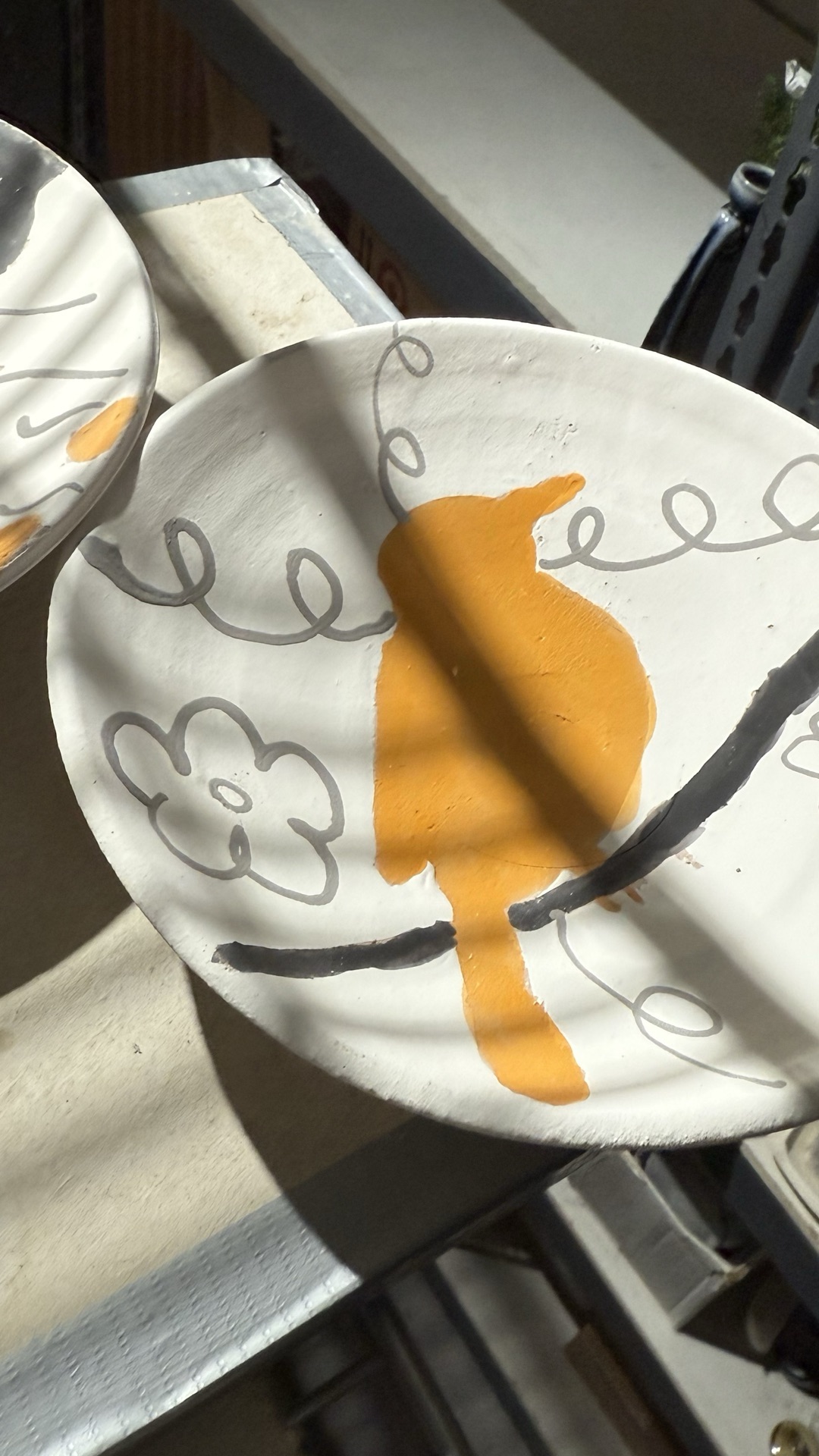 Hi everyone!!
Just thought I would share a picture of some WIP as I prepare to fire the kiln again. I am trying to achieve more depth in my surfaces with the layering of different decorating materials and I am excited to see what information this Bullocks Oriole plate provides me with.
Will post pics of some finished pots soon!!
